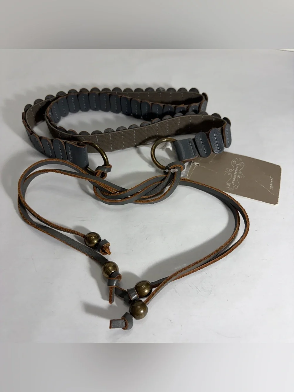 NWT Anthropologie Dark Grey Leather Oval Segment Stretch Tie Belt Brass Beads M